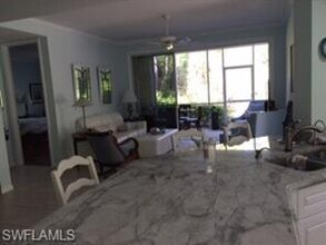 1085 Egrets Walk Cir-Unit -102 in Naples, FL - Building Photo - Building Photo