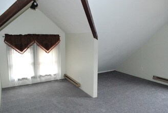 25 Harper St, Unit 3 in Rochester, NY - Foto de edificio - Building Photo