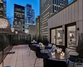 84 William St-Unit -1406 in New York, NY - Building Photo - Building Photo