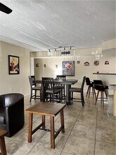 5065 Wiles Rd in Coconut Creek, FL - Building Photo - Building Photo