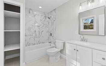 18 Canine Rd in Holtsville, NY - Building Photo - Building Photo