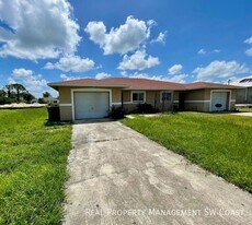 309 Ivan Ave S in Lehigh Acres, FL - Building Photo