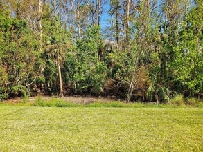 14185 Oviedo Pl in Tice, FL - Foto de edificio - Building Photo