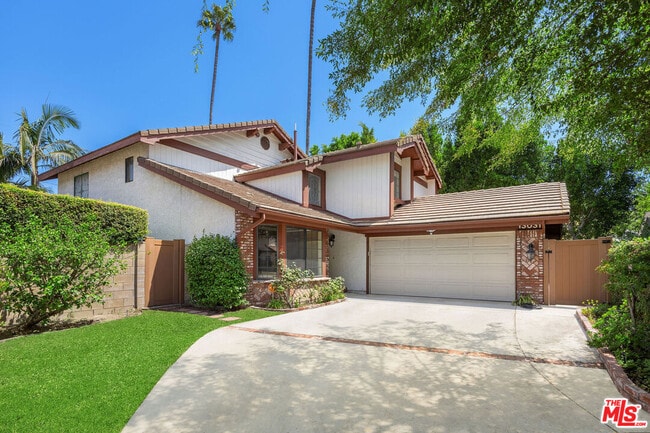 property at 13031 Magnolia Blvd