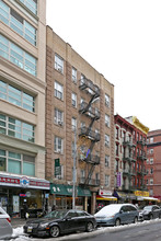 209 Grand St in New York, NY - Building Photo - Building Photo