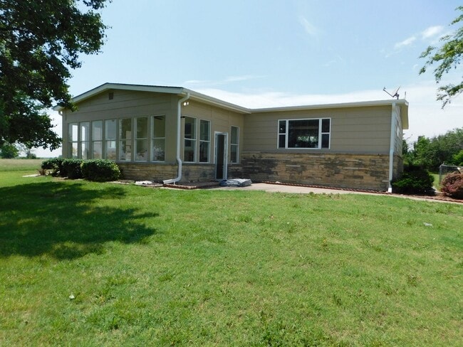 property at 10523 SW Tawakoni Rd