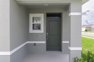 3302 Pine Lily Ave in Poinciana, FL - Building Photo - Building Photo