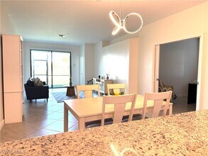 14010 Winding Cedar Wy in Miromar Lakes, FL - Building Photo - Building Photo