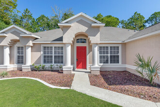 96 Whispering Pine Dr in Palm Coast, FL - Building Photo - Building Photo