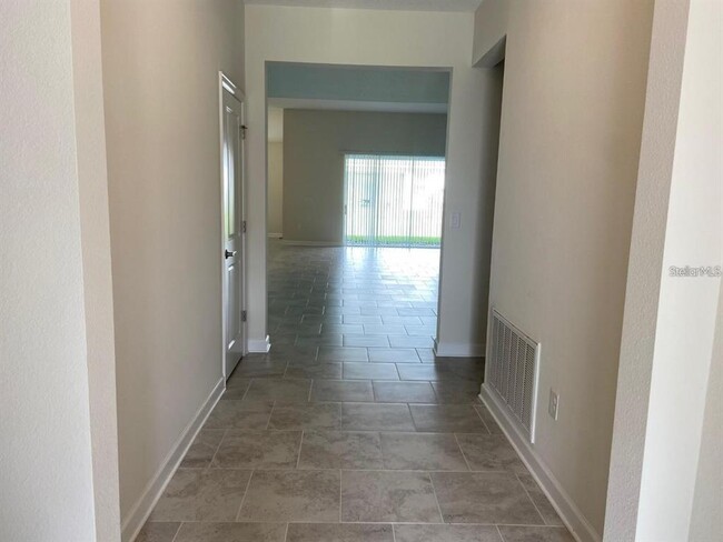 1488 Olympic Club Blvd in Four Corners, FL - Building Photo - Building Photo