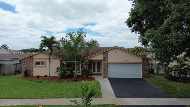 property at 11950 SW 49th Ct