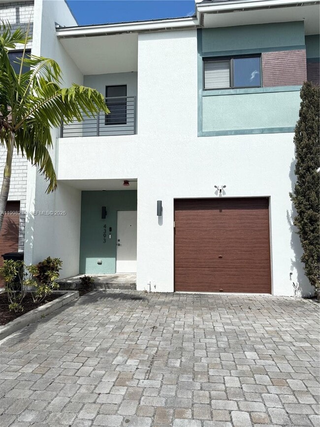 property at 4393 NW 9th St.