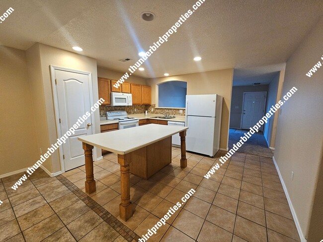 1318 Spruce Meadows Dr NE in Rio Rancho, NM - Building Photo - Building Photo