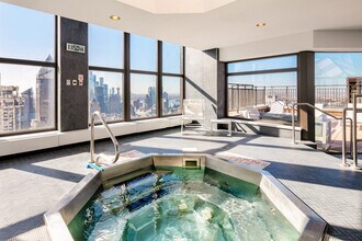 225 W 56th St in New York, NY - Building Photo - Building Photo