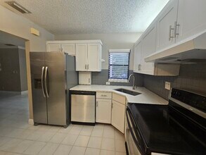 2738 Carambola Cir S, Unit 2nd floor in Coconut Creek, FL - Building Photo - Building Photo