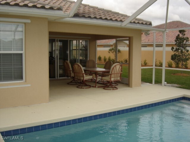 7450 Emilia Ln in Naples, FL - Building Photo