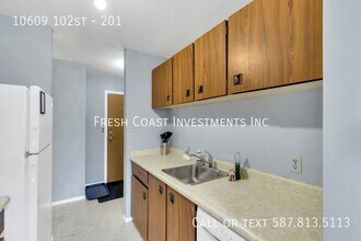 10609 102 St in Grande Prairie, AB - Building Photo - Building Photo