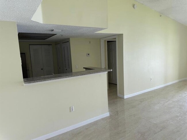 5061 Wiles Rd in Coconut Creek, FL - Building Photo - Building Photo