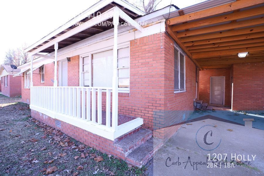 1207 Holly St in Jonesboro, AR - Building Photo