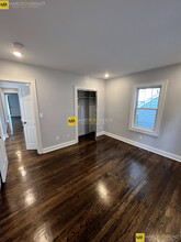 12 Lawrence St, Unit #1 in Watertown, MA - Foto de edificio - Building Photo