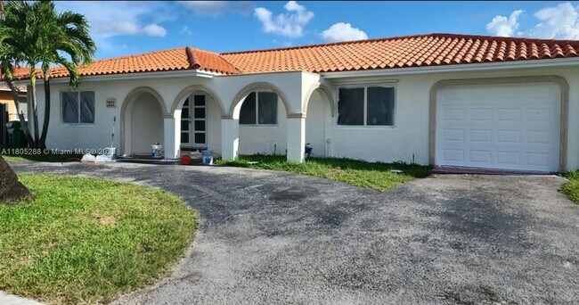 property at 13254 SW 13th St