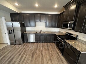 23588 E Ida Dr in Aurora, CO - Building Photo - Building Photo