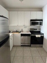 1455 N Treasure Dr, Unit 1C in North Bay Village, FL - Building Photo - Building Photo