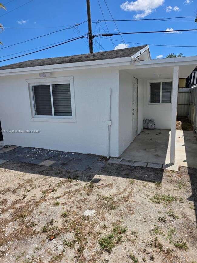 property at 3060 NW 98th St