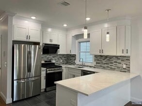 231 Cleveland Ave, Unit 1F+G in Harrison, NJ - Building Photo - Building Photo