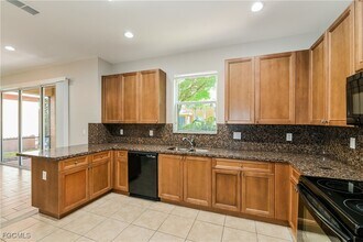 10120 N Golden Elm Dr in Estero, FL - Building Photo - Building Photo