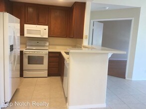 3969 Mahaila Ave-Unit -Unit 107 in San Diego, CA - Building Photo - Building Photo