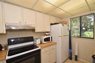 1709 Pelican Cove Rd, Unit GL349 in Sarasota, FL - Building Photo - Building Photo
