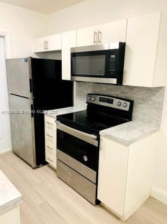 property at 738 NE 86th St