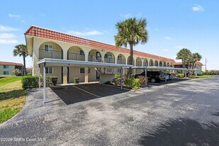 201 St Lucie Ln, Unit 301 in Cocoa Beach, FL - Building Photo