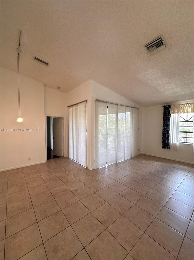 property at 10791 NW 14th St