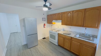 1438 Presstman St in Baltimore, MD - Foto de edificio - Building Photo