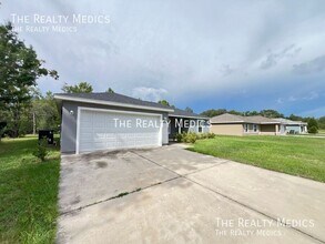 461 Malauka Loop in Ocklawaha, FL - Building Photo - Building Photo
