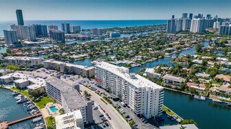 401 Golden Isles Dr, Unit 304 in Hallandale Beach, FL - Building Photo