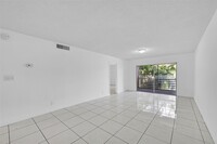 8605 W Sample Rd, Unit 209 in Coral Springs, FL - Building Photo - Building Photo