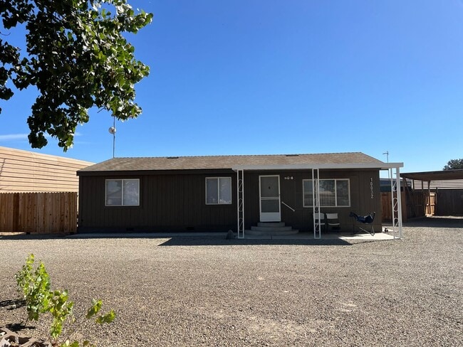 property at 10032 S Tegner Rd