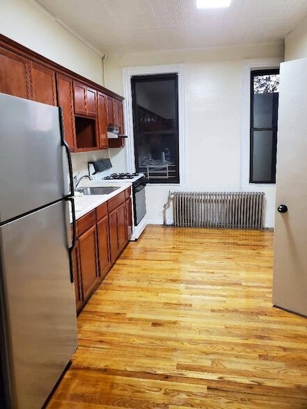 property at 59-28 56th St