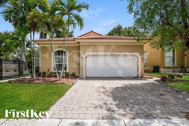 property at 1695 NE 37th Pl