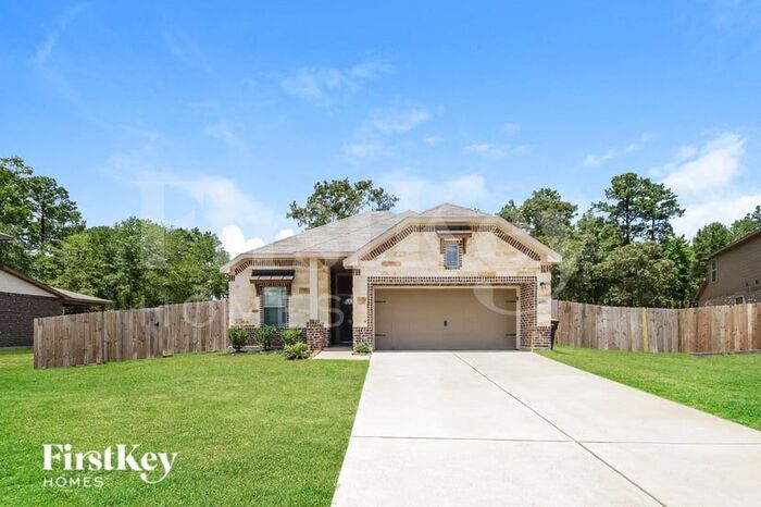 6197 White Oak Leaf Lp in Cut And Shoot, TX - Building Photo