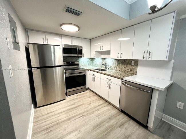 property at 636 NE 63rd St