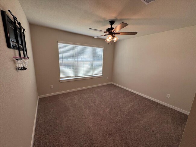 7630 Tramontana Ln in Mont Belvieu, TX - Building Photo - Building Photo