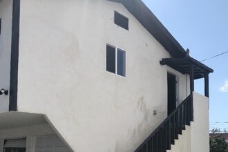 210 W 57th St, Unit 1/4 in Los Angeles, CA - Building Photo - Building Photo