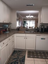 2624 Woodgate Ln, Unit Pinewood Village in Sarasota, FL - Building Photo - Building Photo