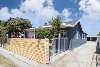 8722 Orchard Ave in Los Angeles, CA - Building Photo - Building Photo