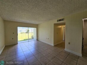 1215 Benoist Farms Rd in Royal Palm Beach, FL - Building Photo - Building Photo