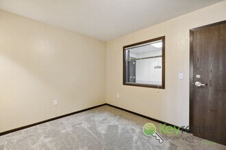 1411 S Douglas Ave in Lyons, KS - Building Photo - Building Photo